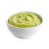 Een klein schaaltje met daarin guacamole saus gemaakt met super chlorella Een klein schaaltje met daarin guacamole saus gemaakt met super chlorella