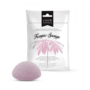 Witte verpakking van de roze konjac spons en ervoor een roze spons Witte verpakking van de roze konjac spons en ervoor een roze spons